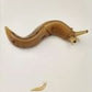 Elysian Shore Banana Slug Hand Blown Glass Pin